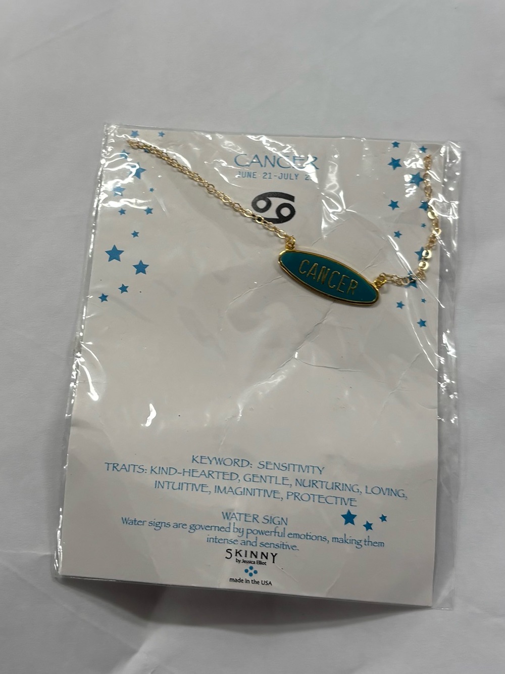 Jessica Elliot Gold-Tone Necklace with Teal Enamel 'Cancer' Pendant